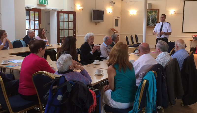 Steve Leader Borough Commander of Barnet London Fire Brigade presenting Fire Safety