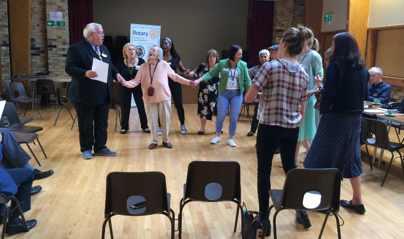 Nick leading the session with Cllr. Sandra Parnell, Sasha the exercise instructor & Cllr Pat Strack holding hands with the members