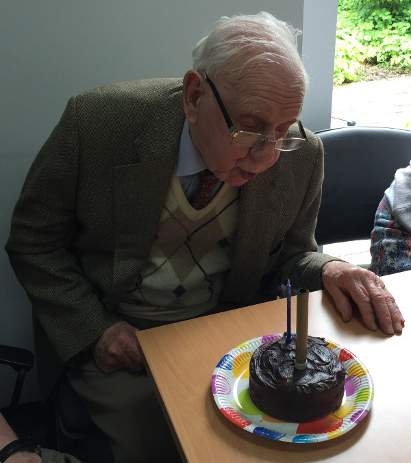 Laurie blowing his birthday candle