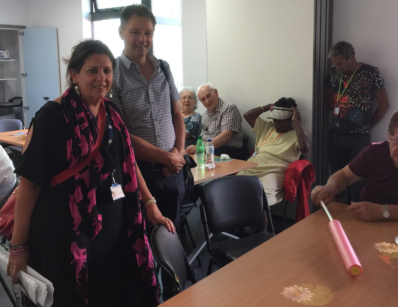 Dr Vivienne Watkin and Steve Bogen watching the Tovertafel