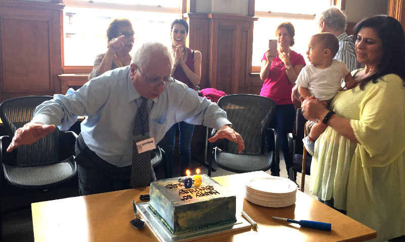 Andreas about to blow out the candles on his birthday cake