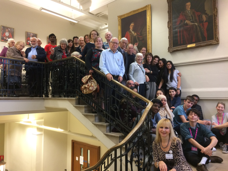 Members from Dementia Club UK and students from NCS on the stairs of Hendon Town Hall