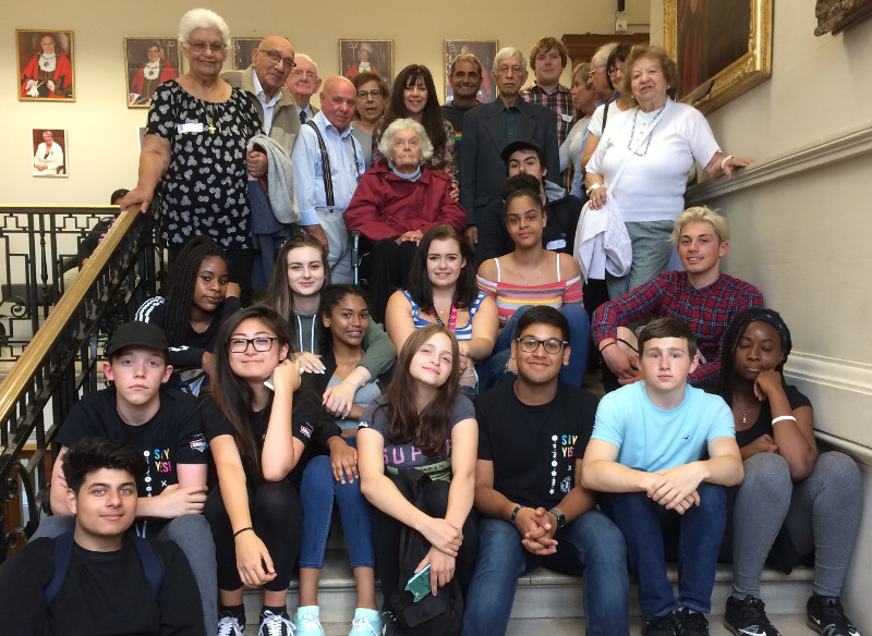 NCS students on the stairs with Dementia Club UK members at Hendon Town Hall