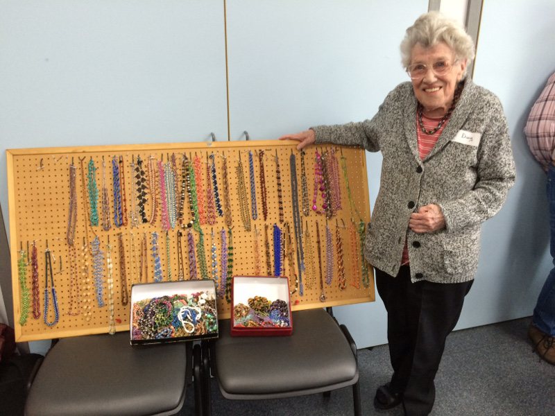Diny displaying her beautiful jewellery at Dementia Club UK
