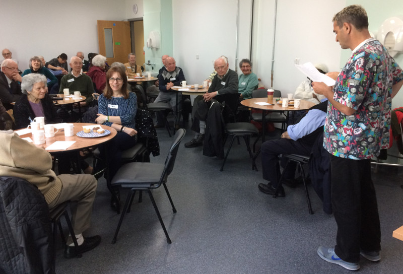 Dementia Club UK volunteer Kevin taking a quiz