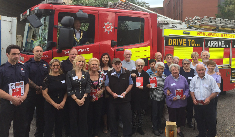 Commander Gary Shinn and his crew from White Watch with members of Dementia Club UK, our partners from Rotary Club of Elstree and Borehamwood with Mayor Eric Silver in the Fire Engine cab