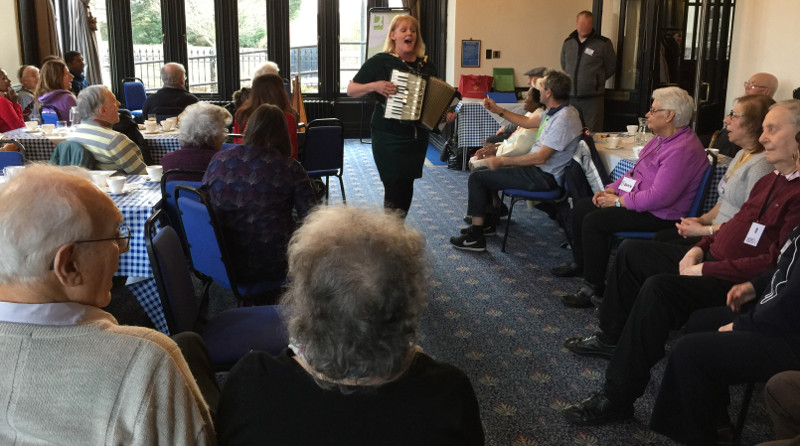 Helen Tierney entertaining the members of Dementia Club UK at Stephens House and Gardens