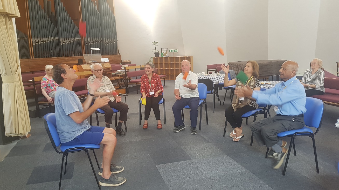 Chair yoga with Richard using colourful beanbags