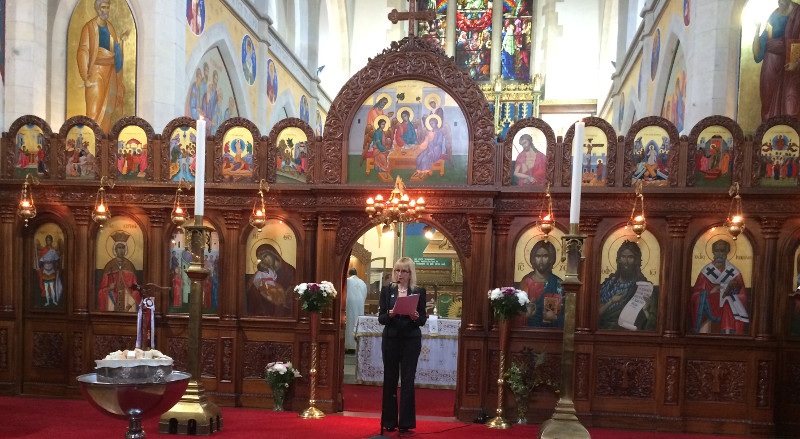 Lisa presenting in the nave of St Michaels. The alter is behind the templon screen with Saints images painted on it