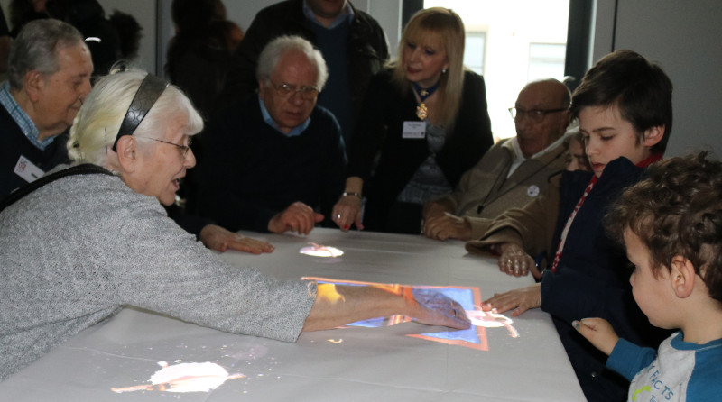 All ages enjoying the games on the Tovertafel