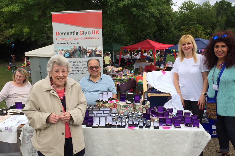 Diny in the foreground who made some of her beaded jewellery for Dementia Club UK to sell