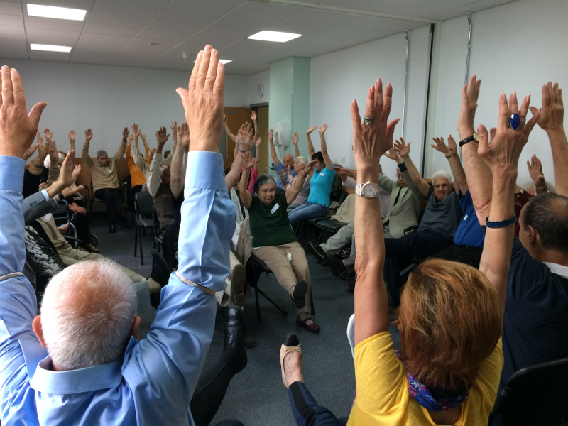 Huge turnout of members doing chair exercises