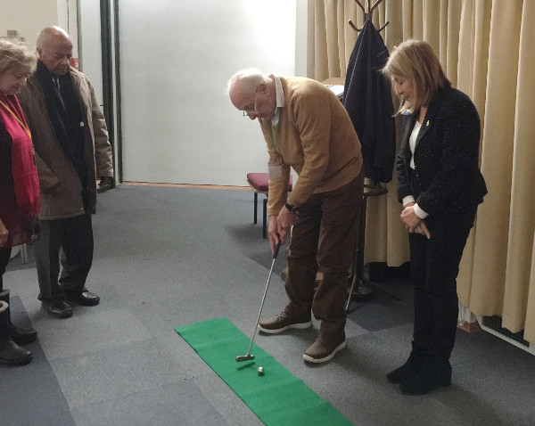 Dr Rebecca giving members a few tips on playing Golf. Denis about to take a Put and the Francis followed with a hole in one